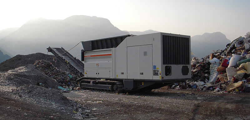 M&J shredder clearing a landfill